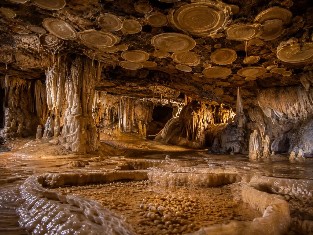 Pech Merle Cave’s concretions gallery, columns and calcite draperies